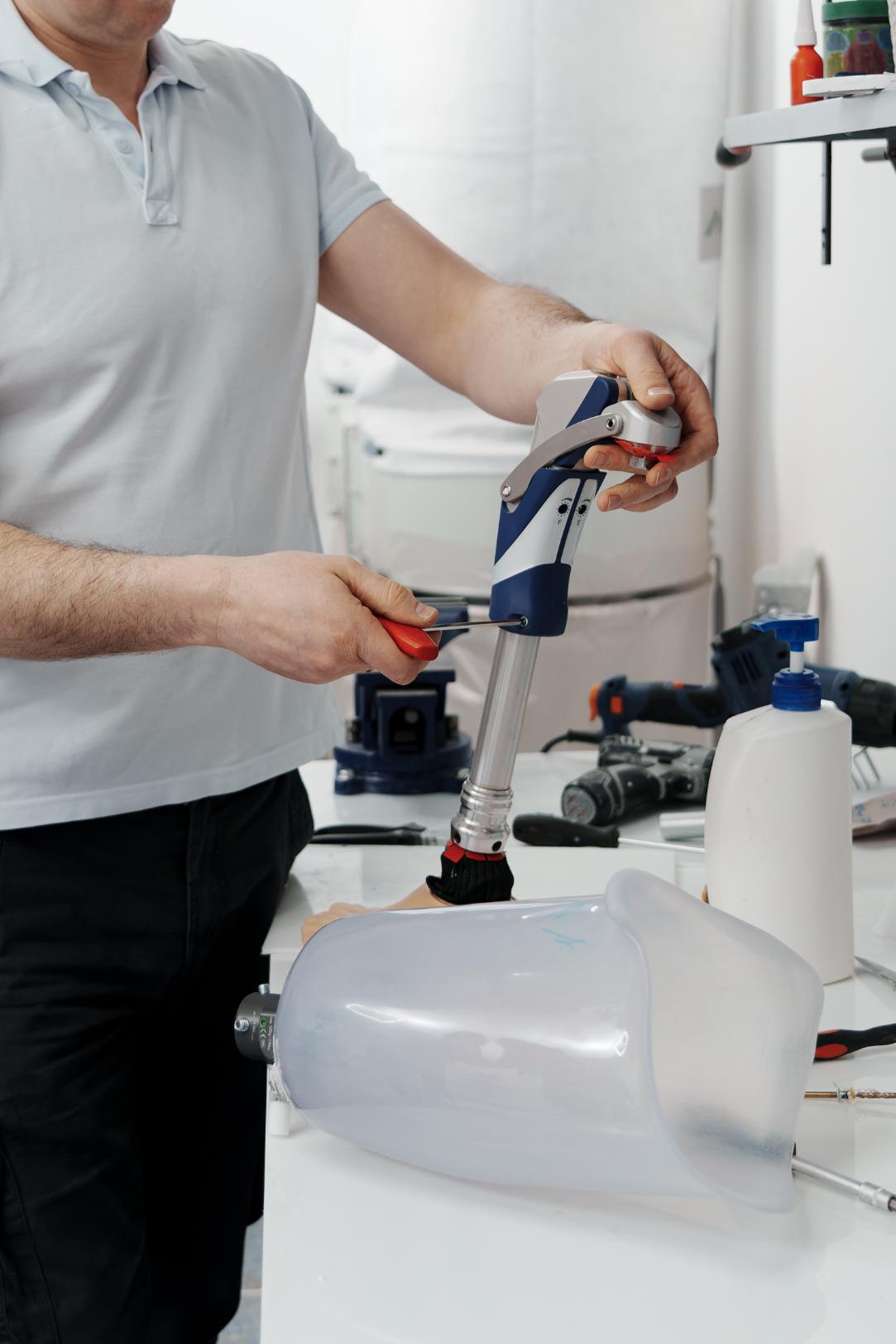 Skilled plumber adjusting water supply valve with precision